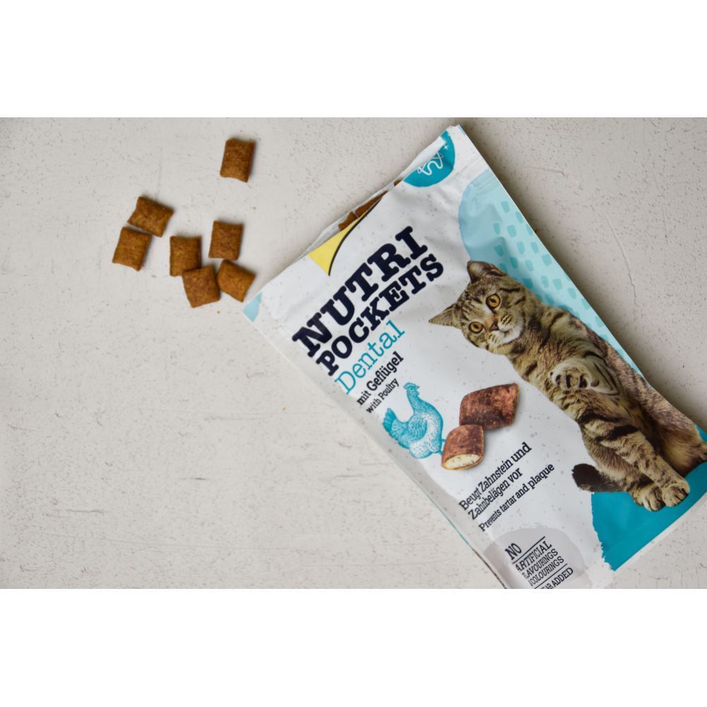 Ласощі для котів GimCat Nutri Pockets Dental 60 г - домашня птиця Ласощі для котів GimCat Nutri Pockets Dental 60 г - домашня птиця